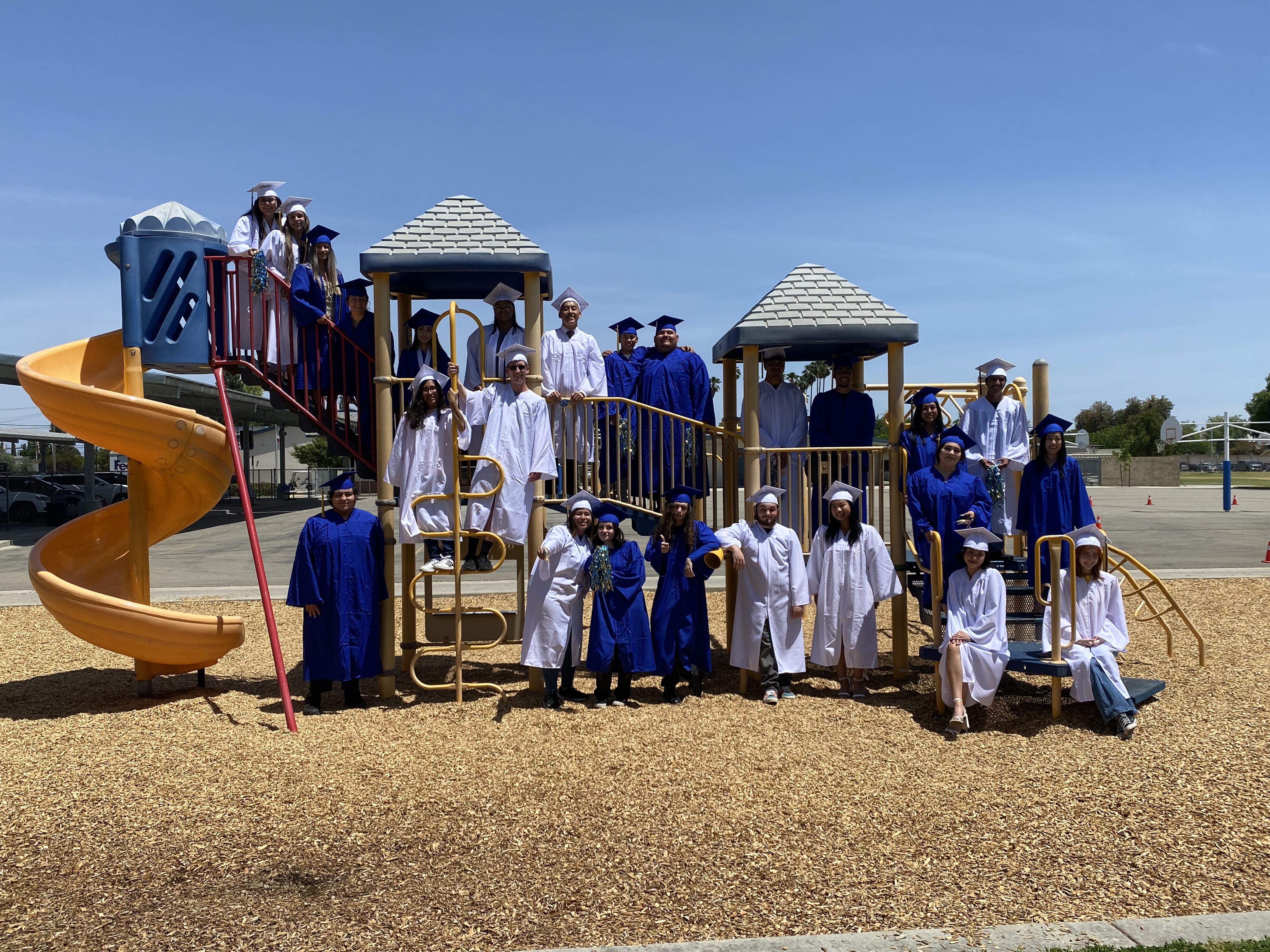 Picture of CHS Students on the Playground Equipment at SV
